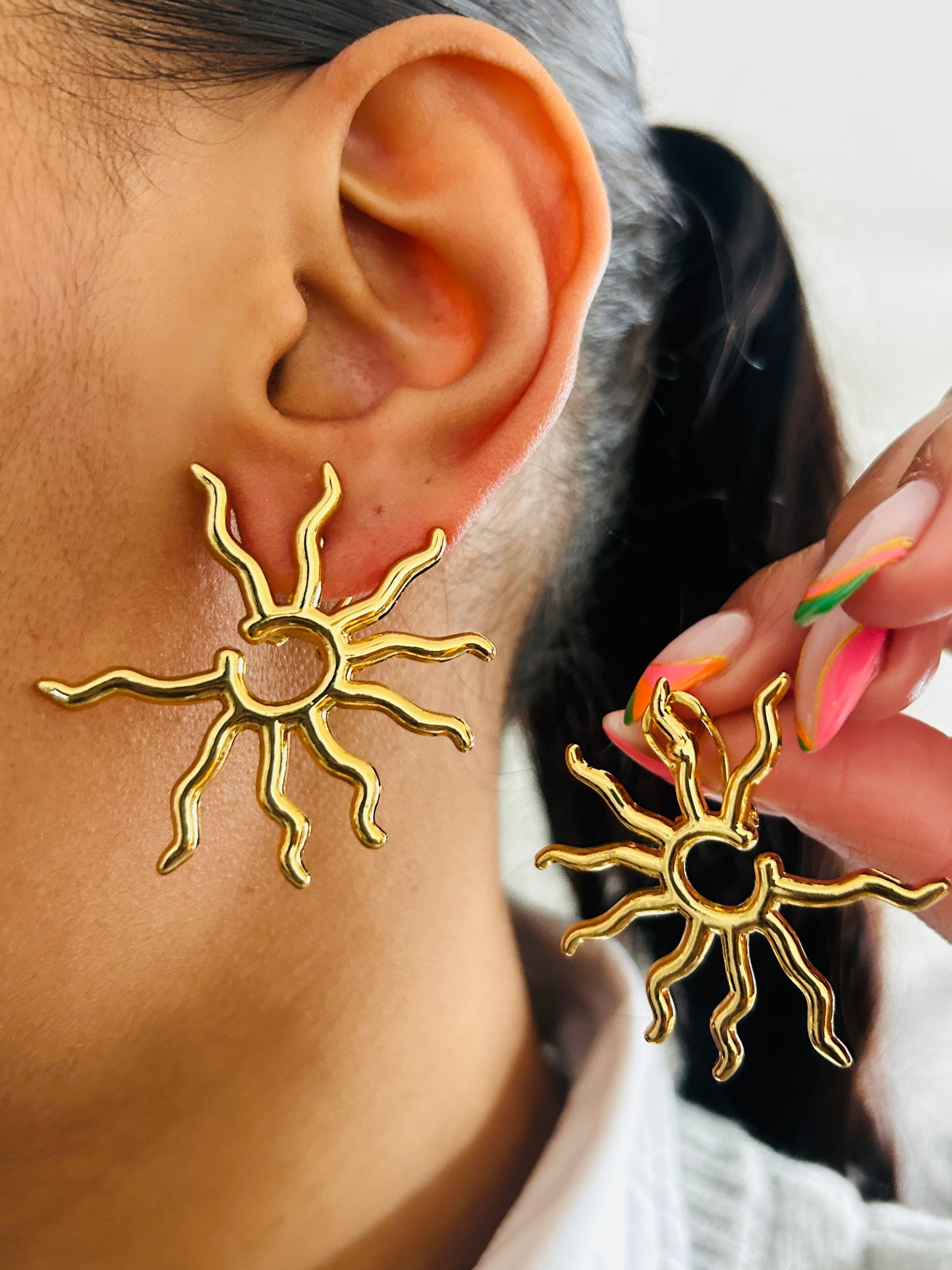 Boucle d'oreille fantaisie dorée