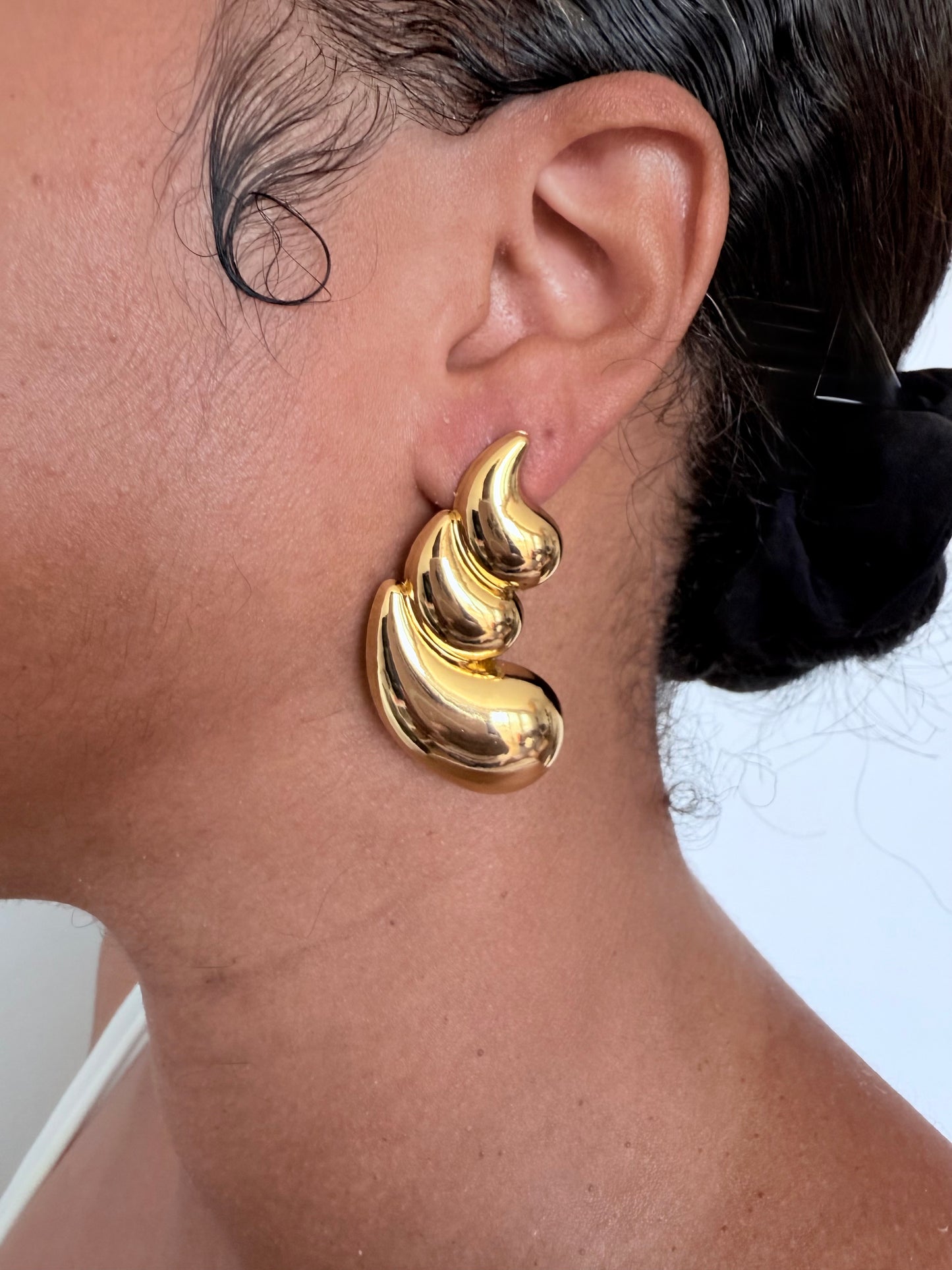 Boucle d'oreille fantaisie dorée