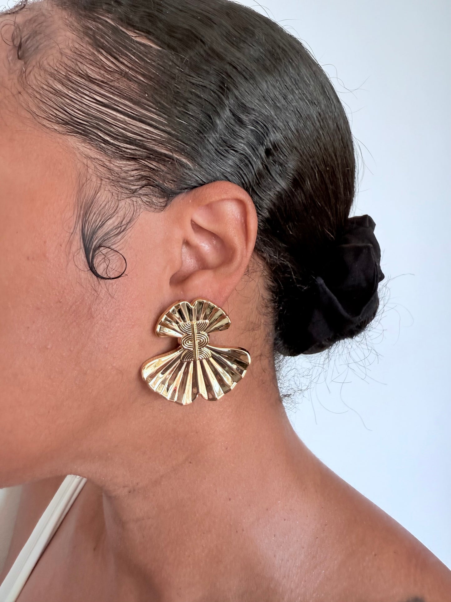 Boucle d'oreille fantaisie dorée