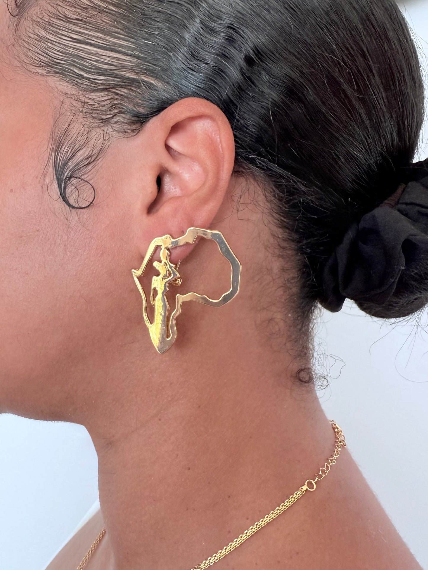 Boucle d'oreille fantaisie dorée