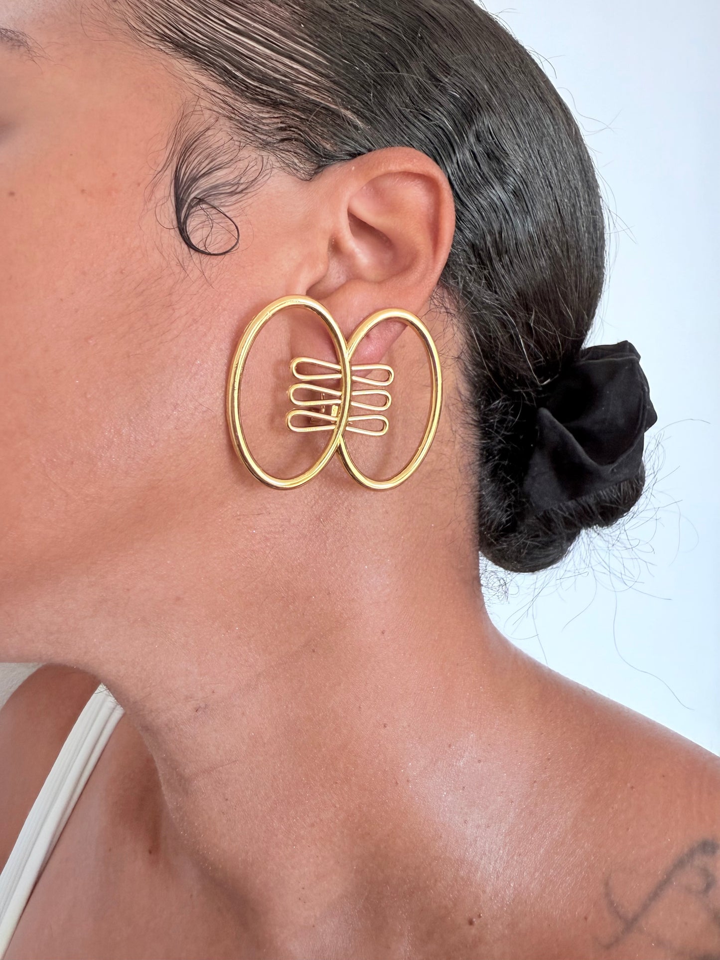 Boucle d'oreille fantaisie dorée