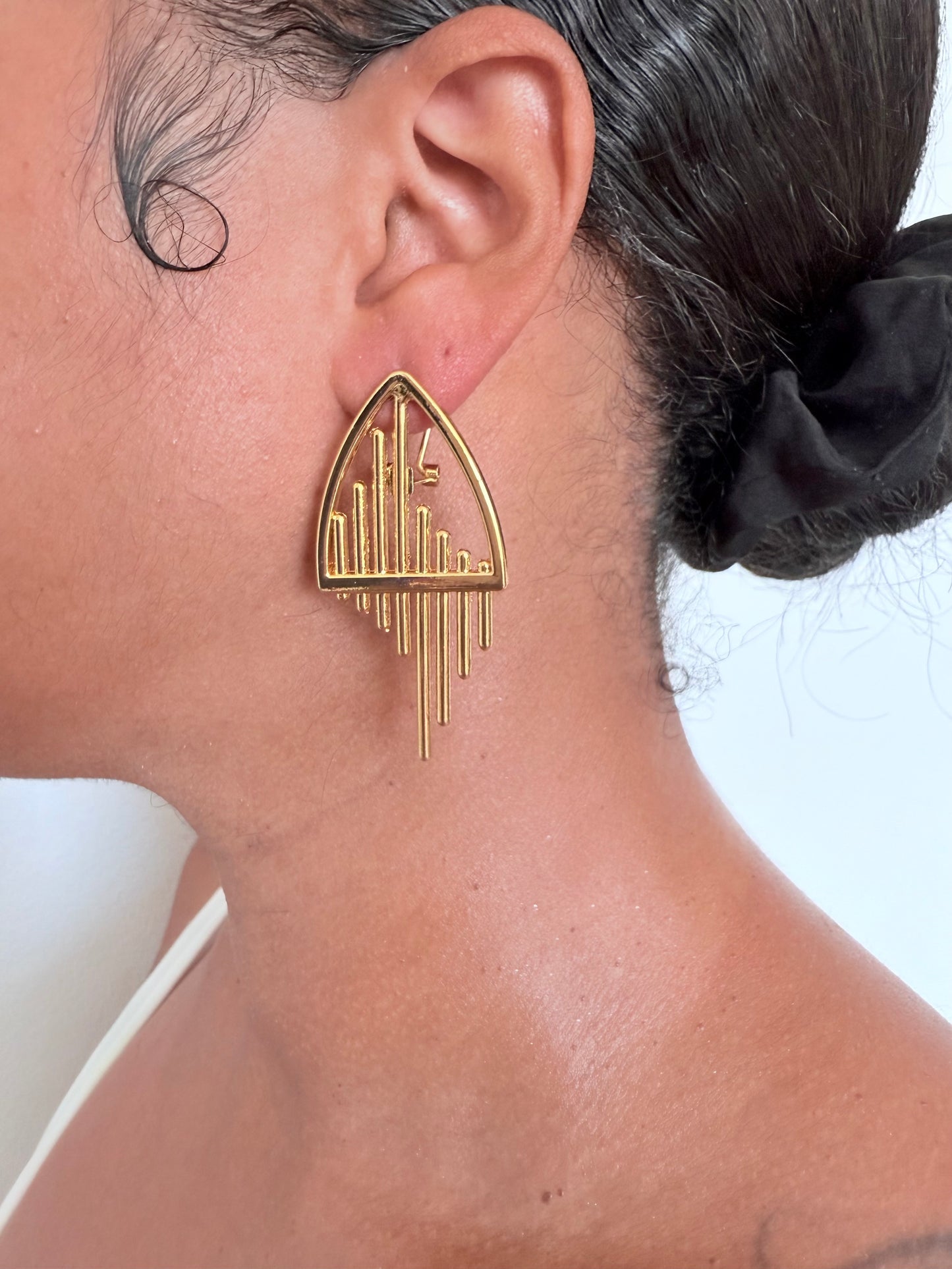 Boucle d'oreille fantaisie dorée