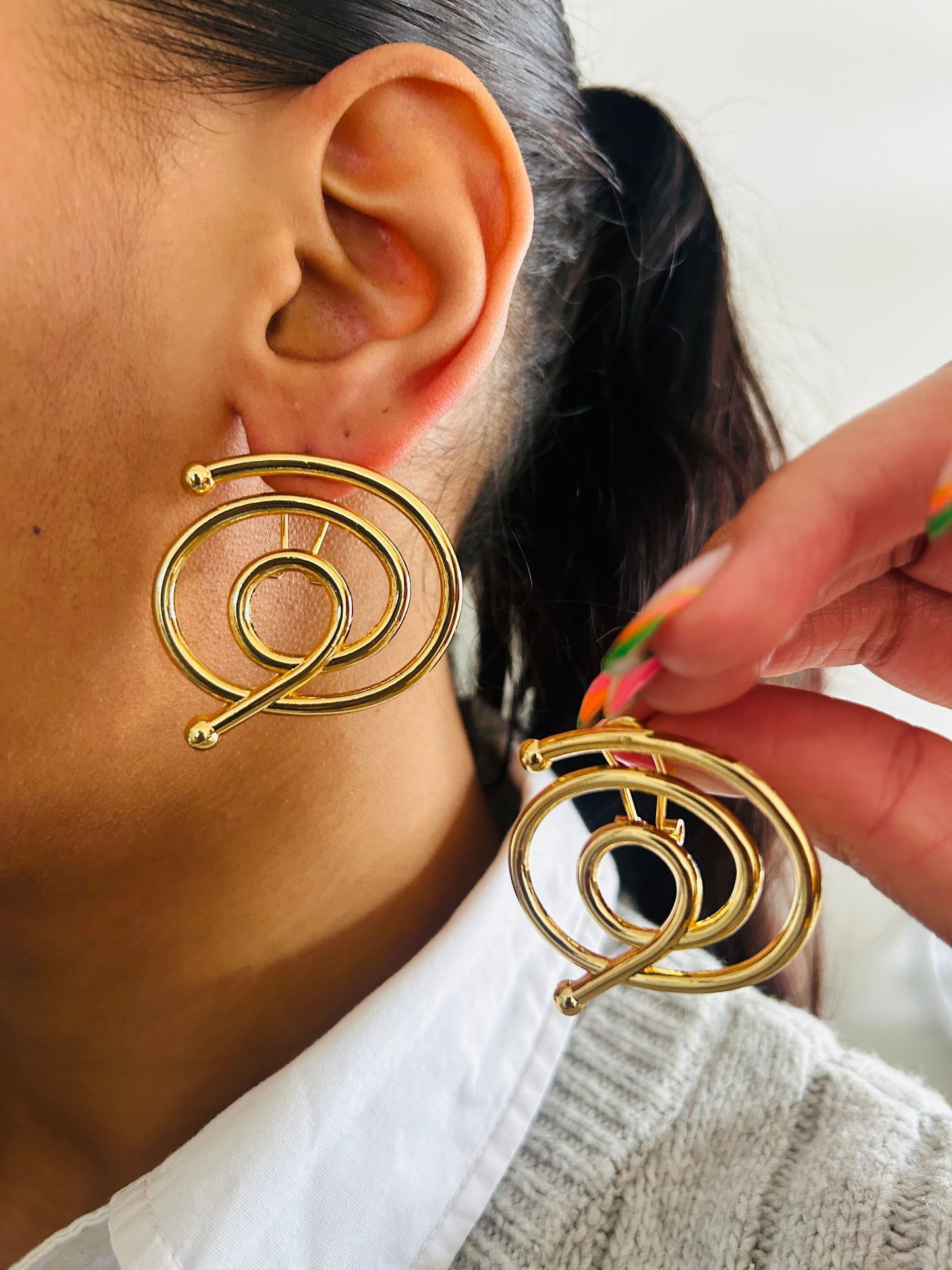 Boucle d'oreille fantaisie dorée
