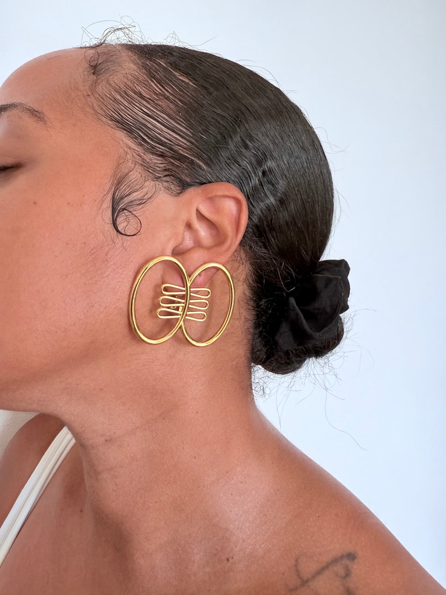 Boucle d'oreille fantaisie dorée