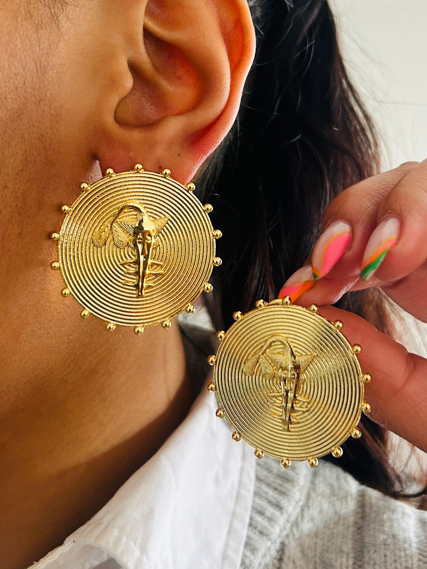 Boucle d'oreille fantaisie dorée