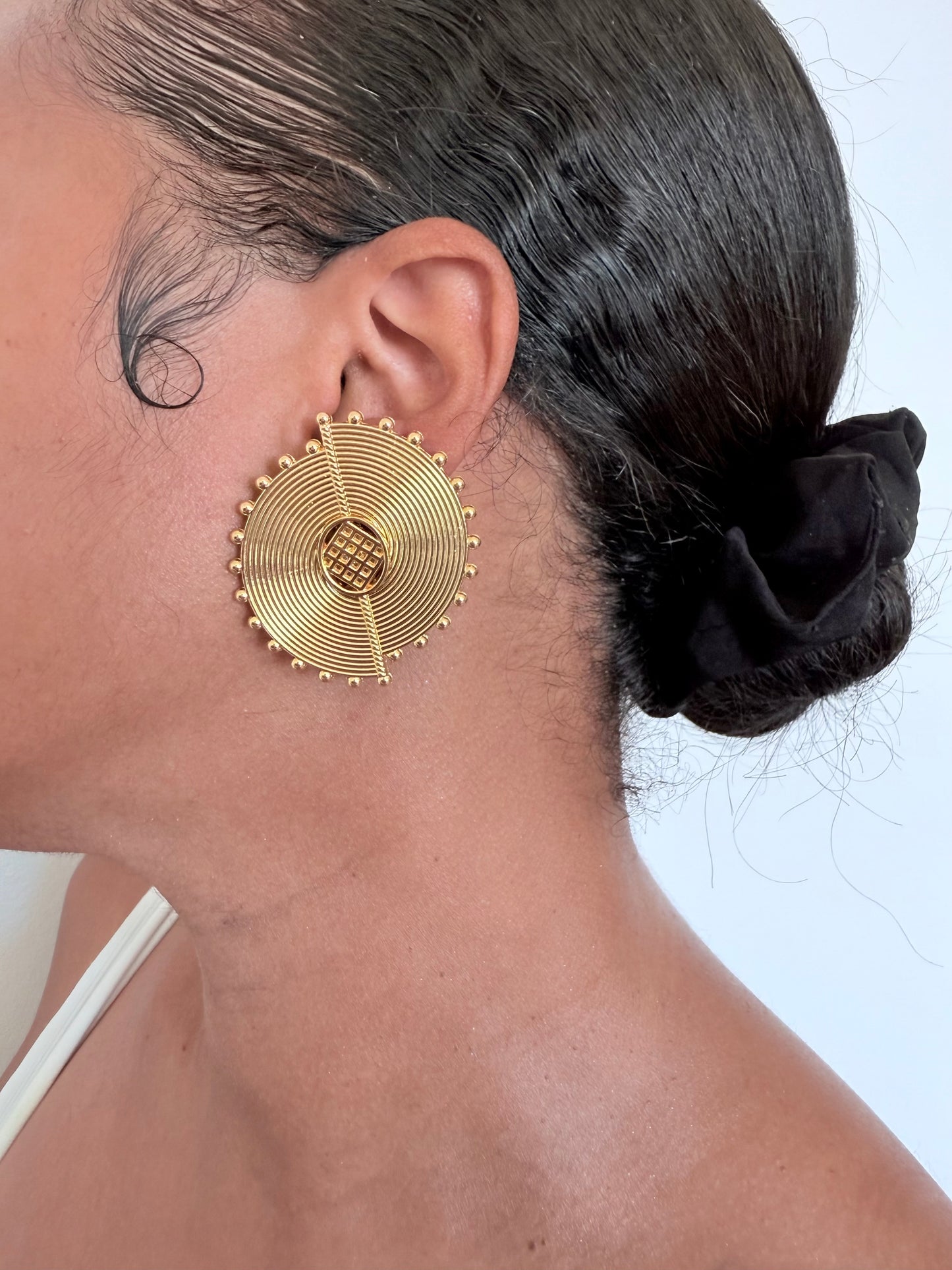Boucle d'oreille fantaisie dorée
