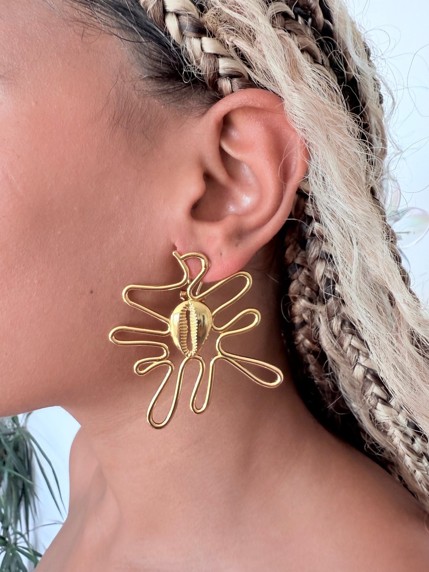 Boucle d'oreille fantaisie dorée