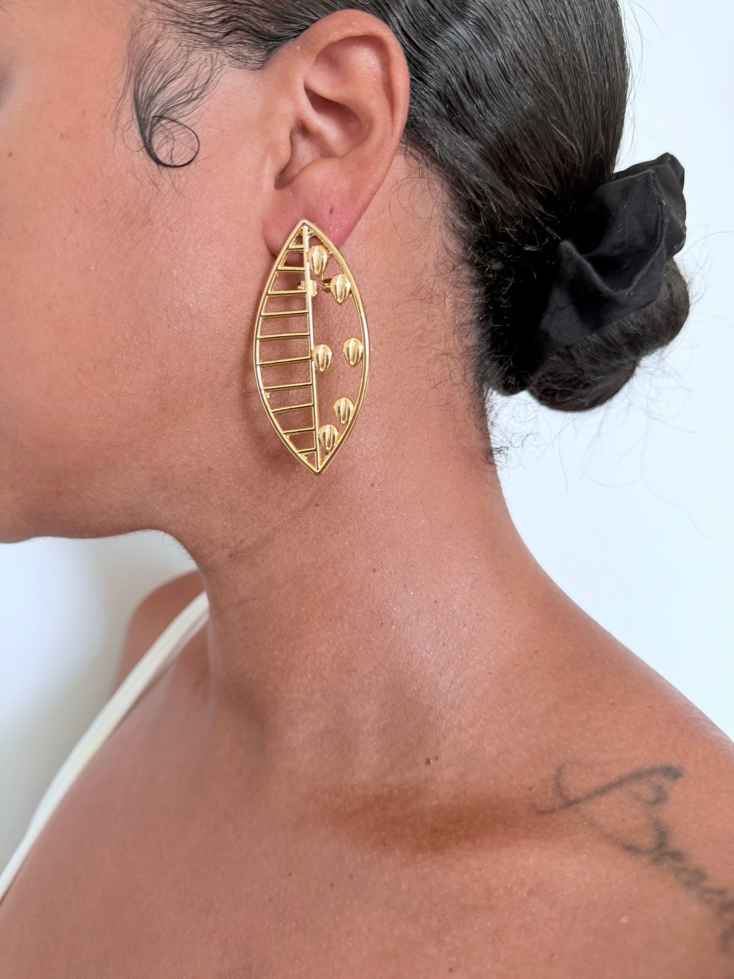 Boucle d'oreille fantaisie dorée