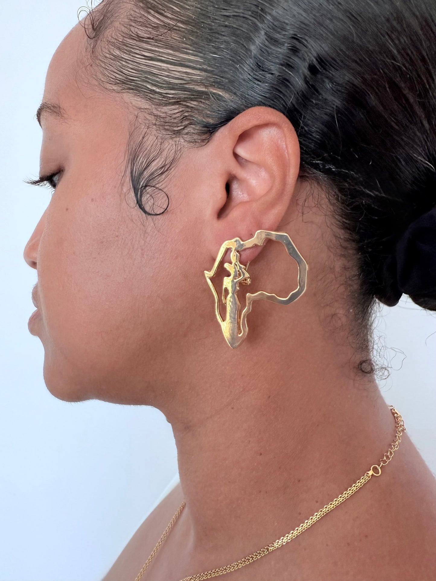 Boucle d'oreille fantaisie dorée