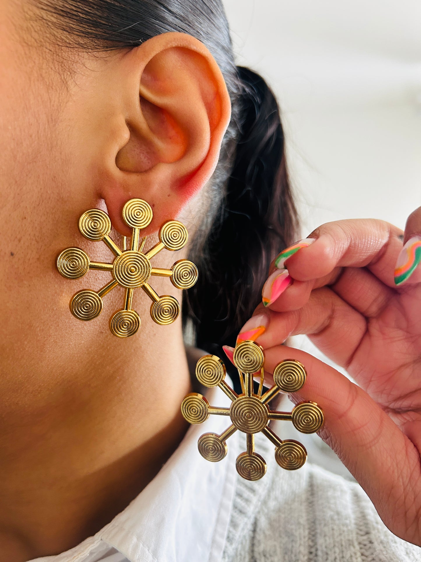 Boucle d'oreille fantaisie dorée