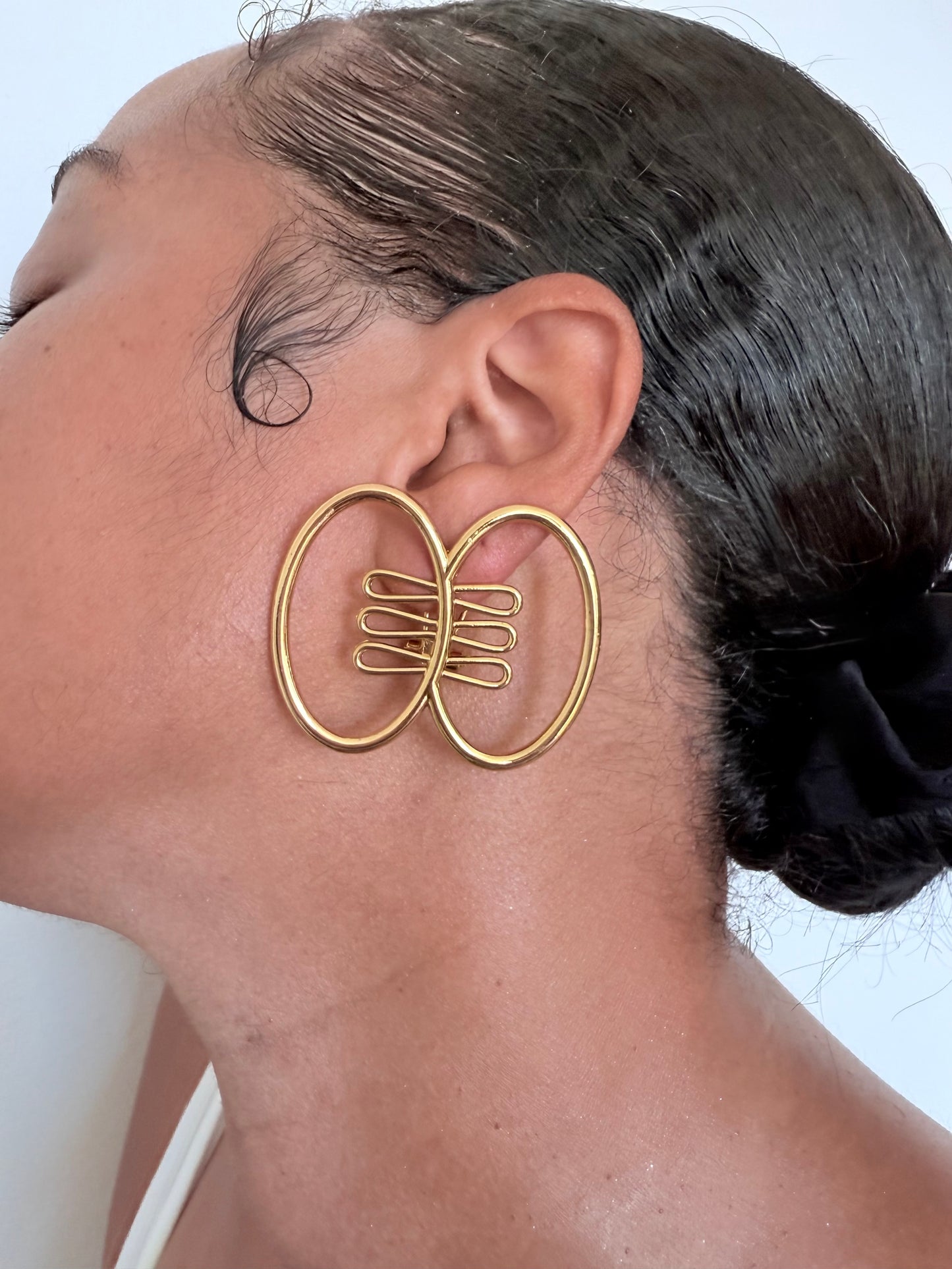 Boucle d'oreille fantaisie dorée