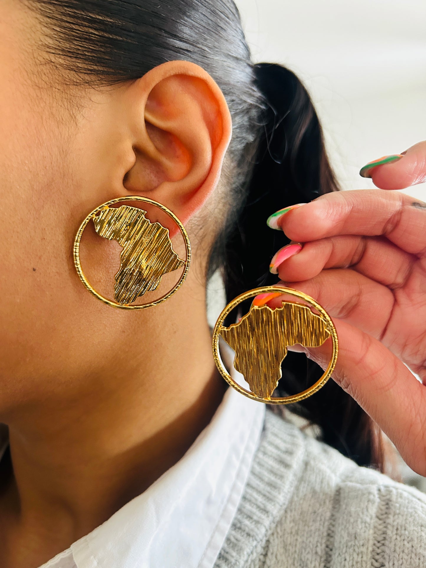 Boucle d'oreille fantaisie dorée