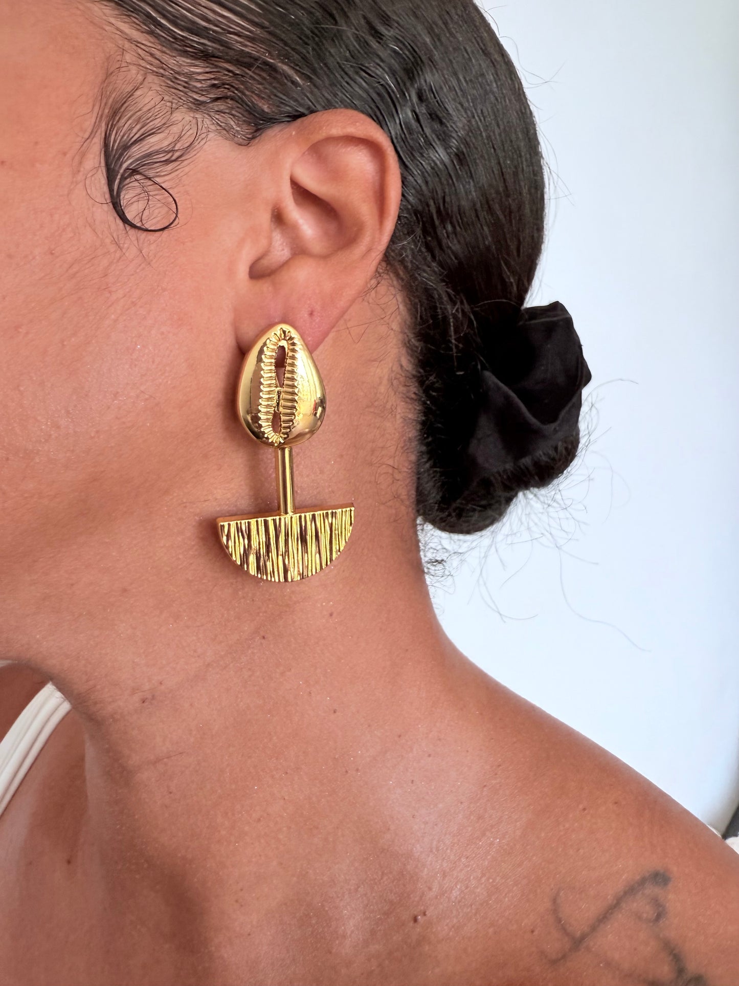 Boucle d'oreille fantaisie dorée