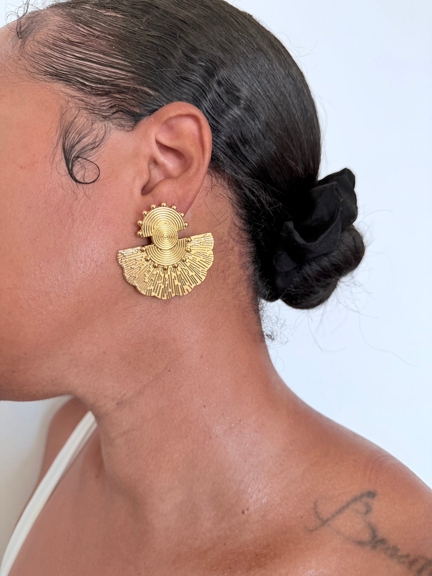 Boucle d'oreille fantaisie dorée