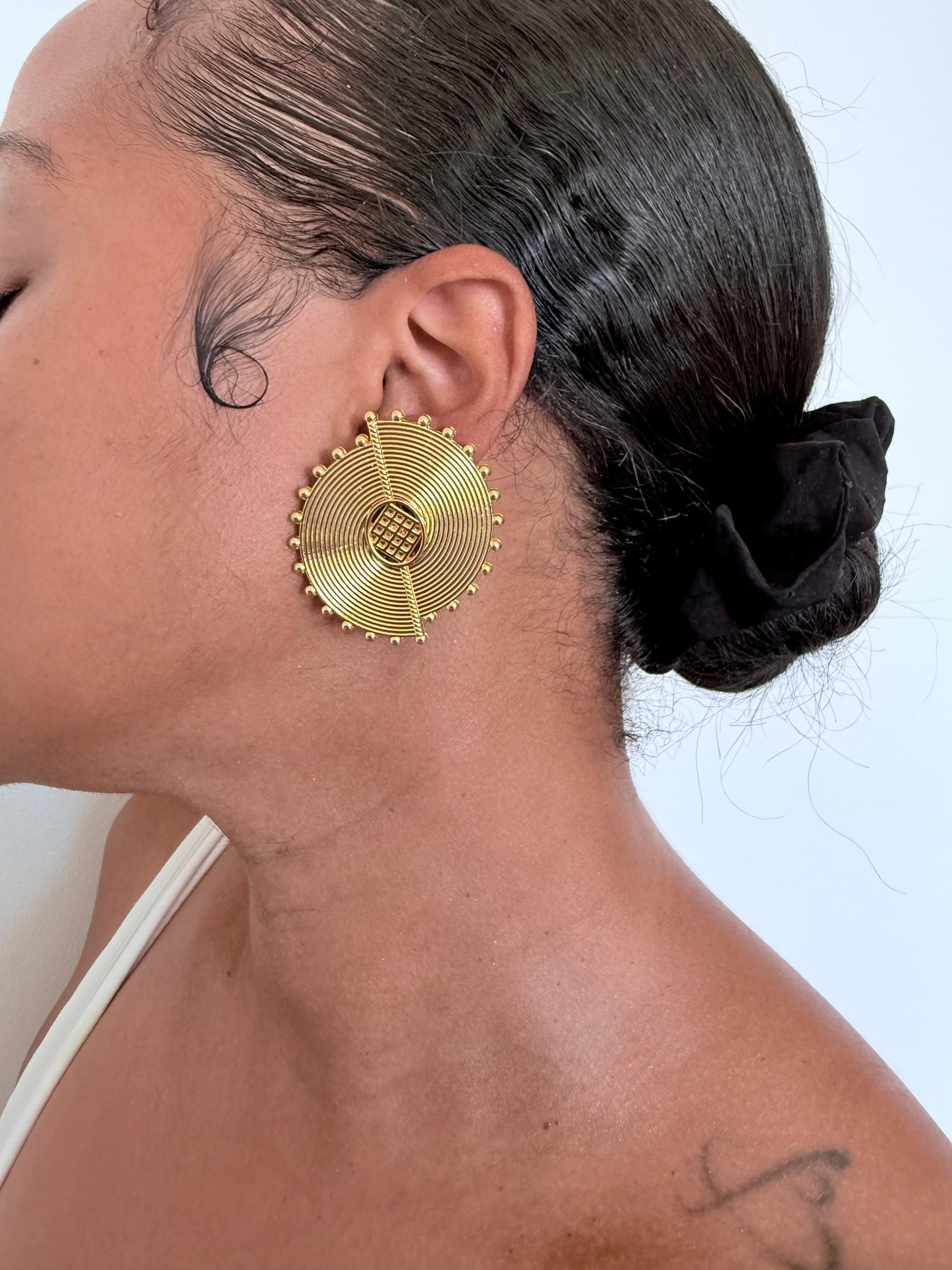 Boucle d'oreille fantaisie dorée