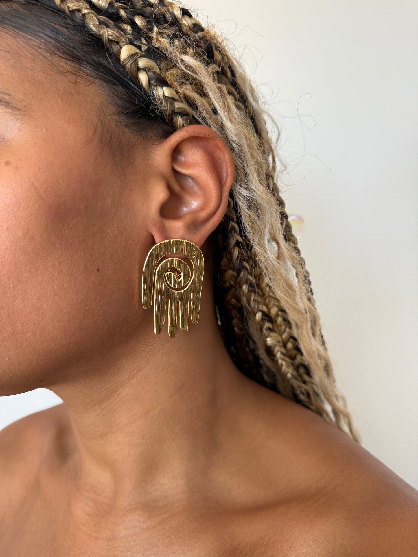 Boucle d'oreille fantaisie dorée