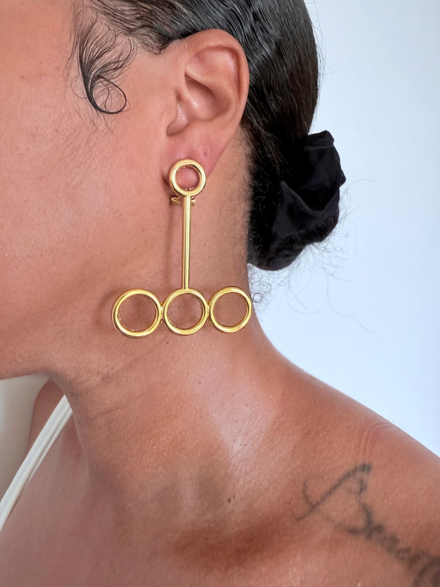 Boucle d'oreille fantaisie dorée