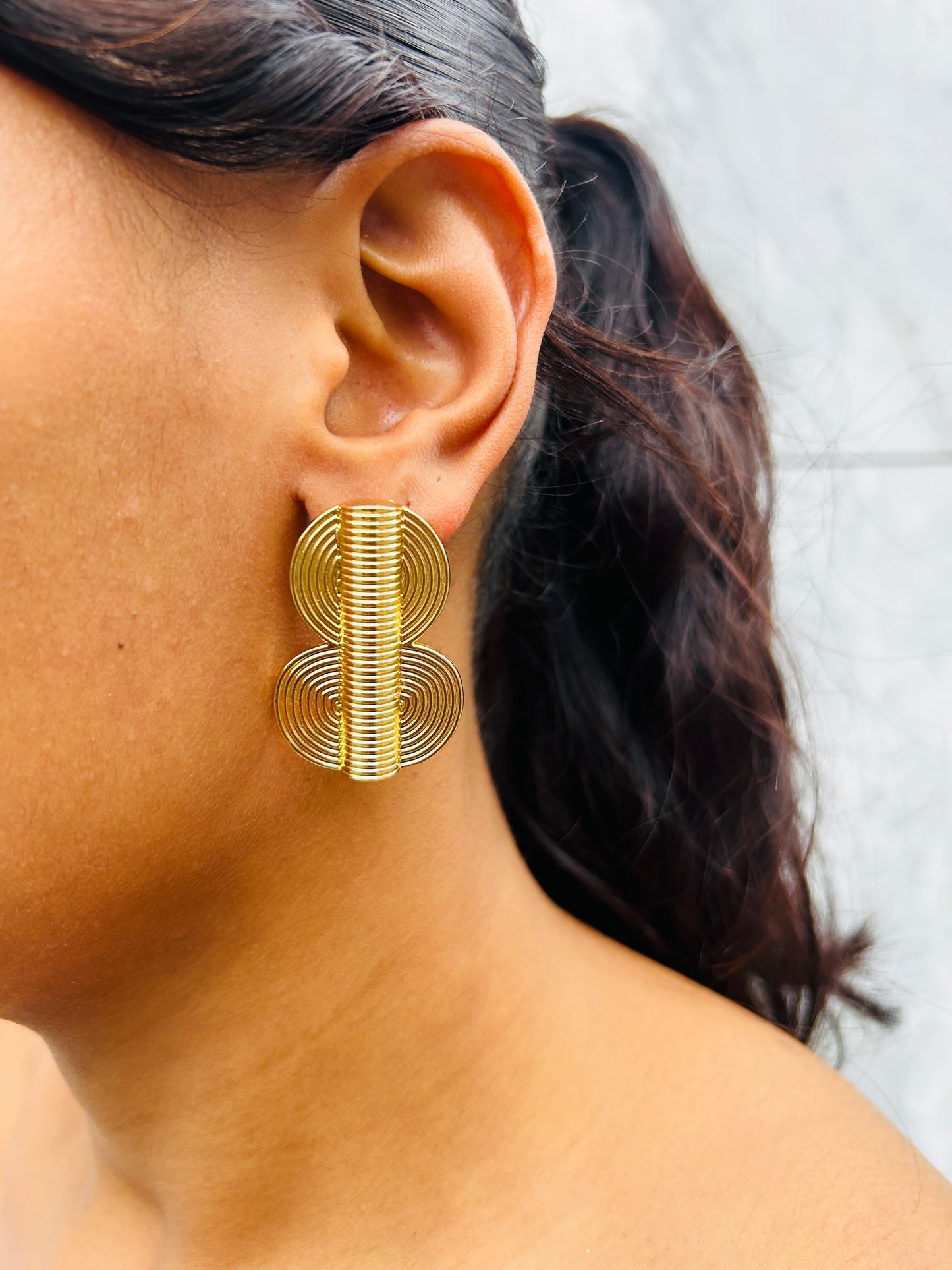 Boucle d'oreille fantaisie dorée