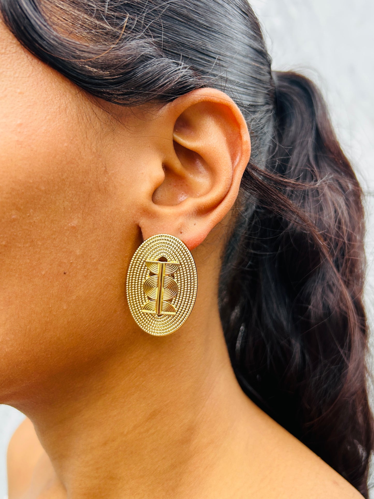 Boucle d'oreille fantaisie dorée