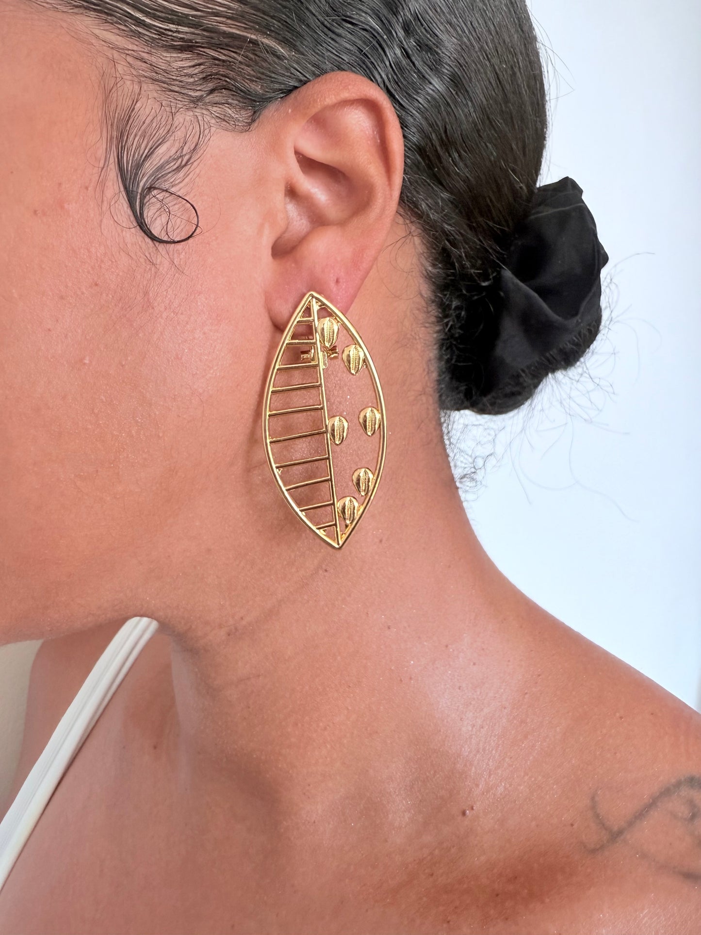 Boucle d'oreille fantaisie dorée