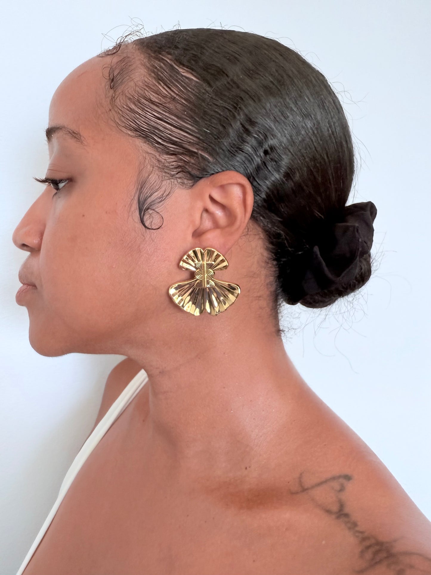 Boucle d'oreille fantaisie dorée