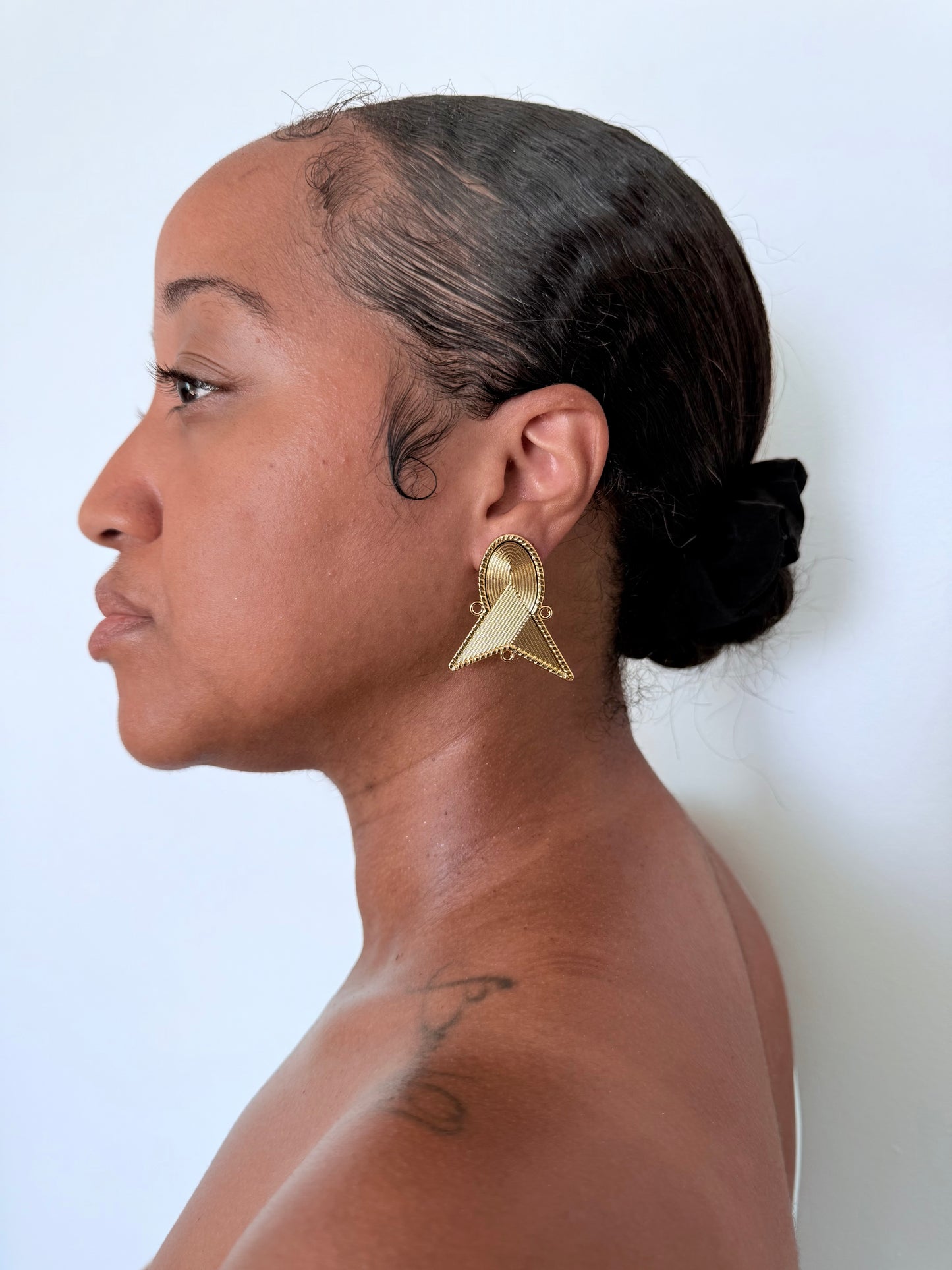 Boucle d'oreille fantaisie dorée