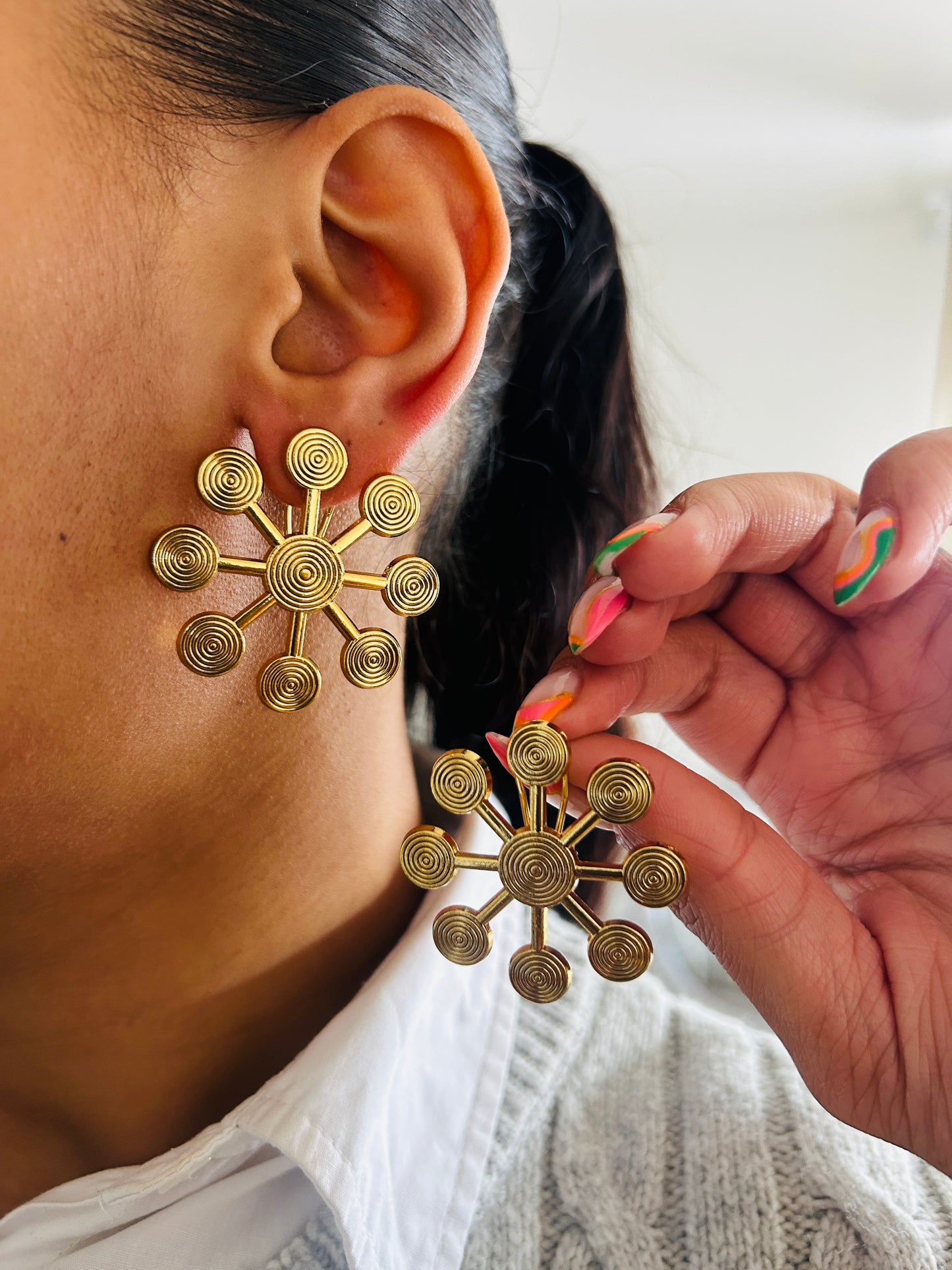Boucle d'oreille fantaisie dorée