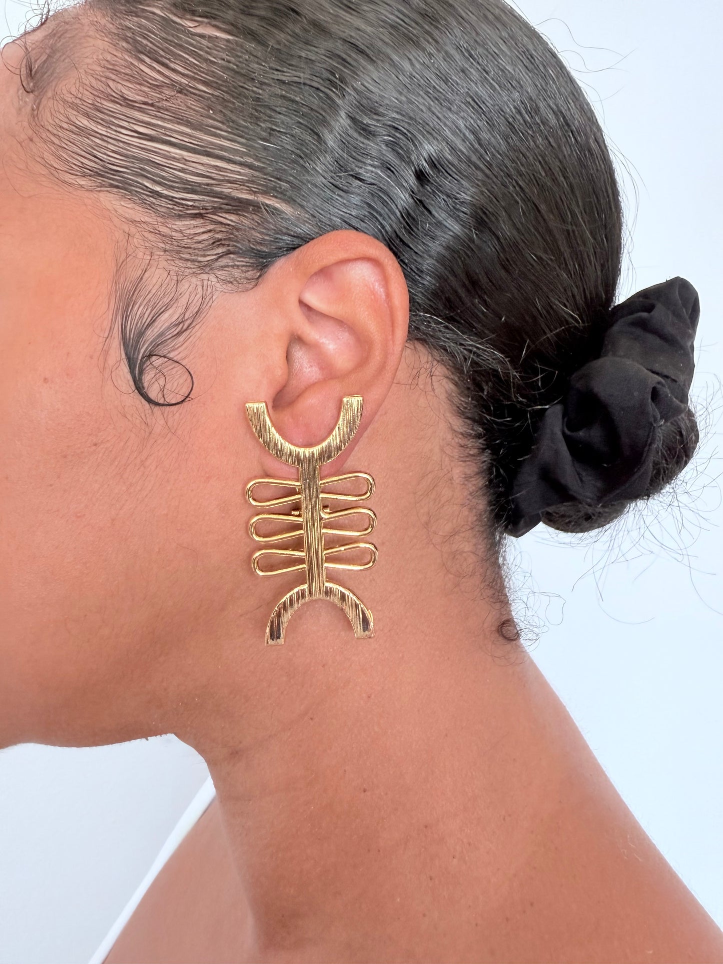 Boucle d'oreille fantaisie dorée