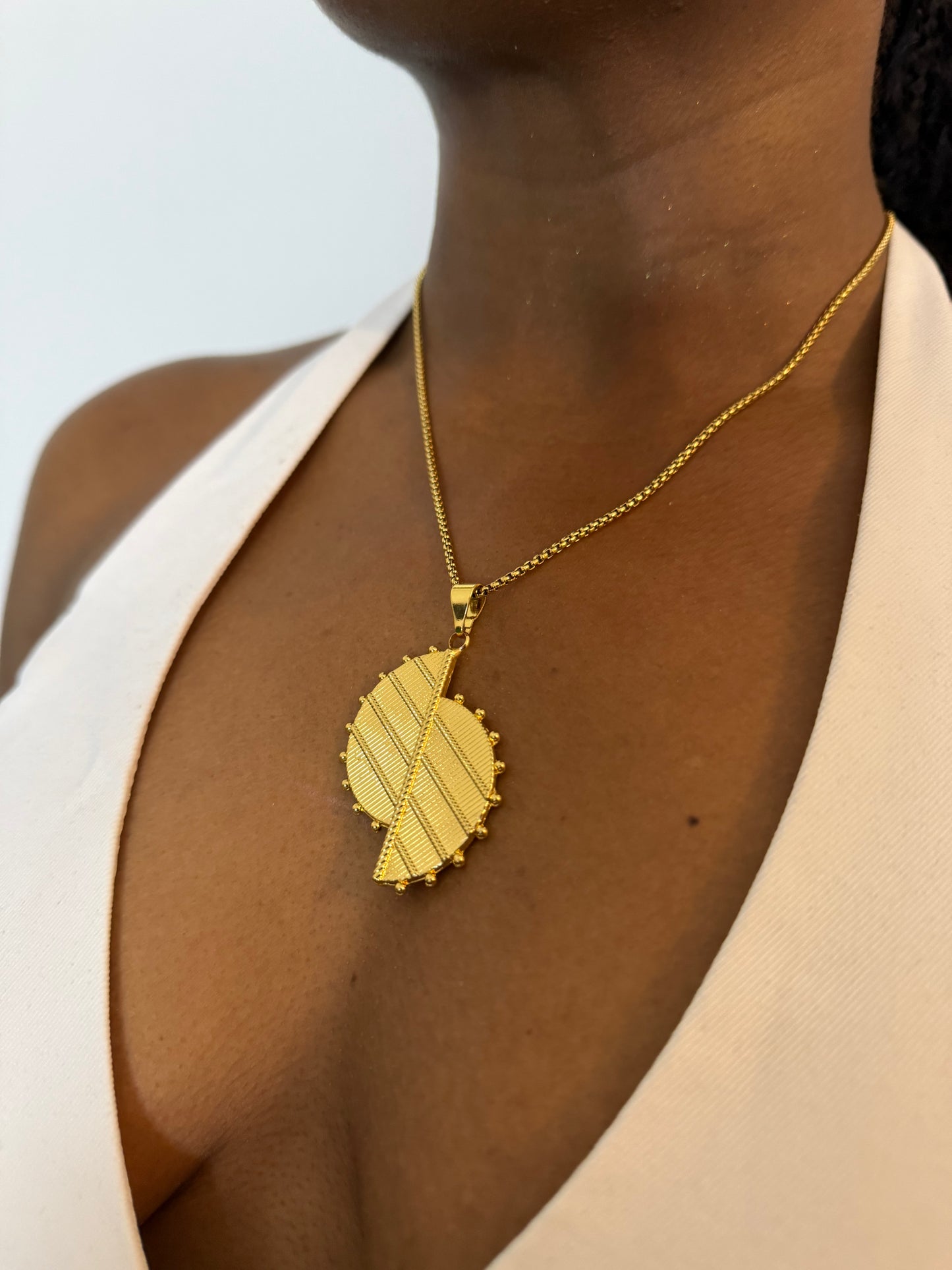 Collier fantaisie doré Afro chic