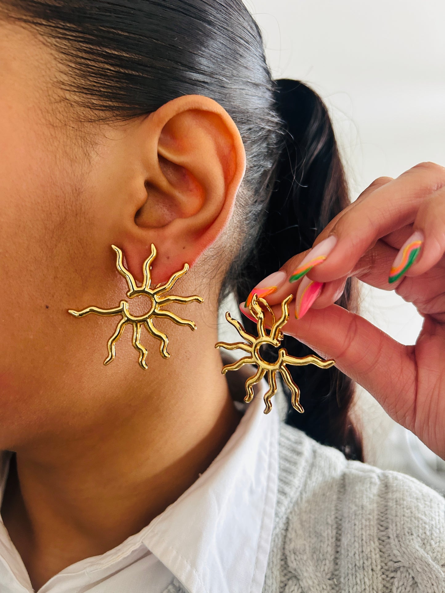 Boucle d'oreille fantaisie dorée