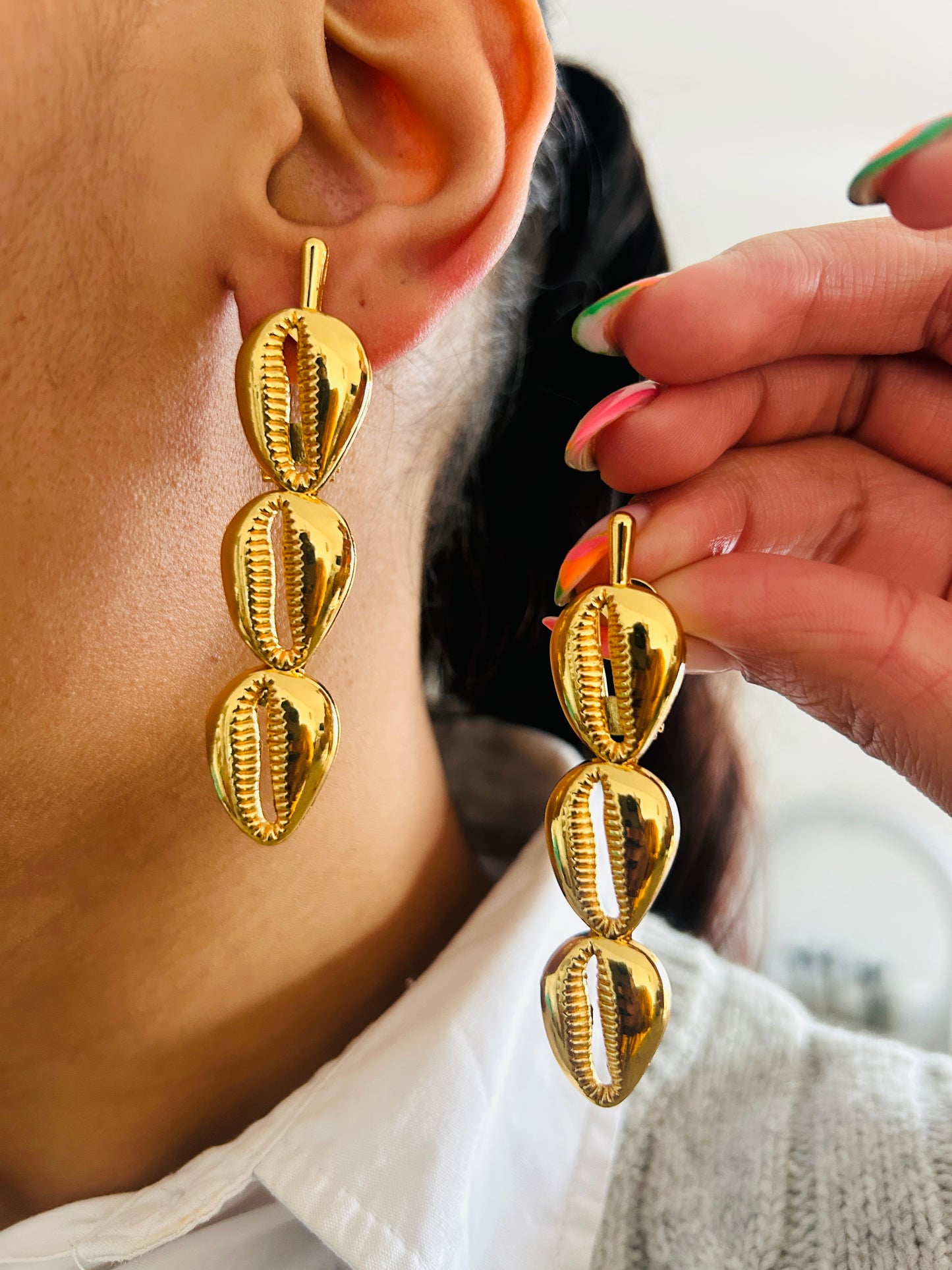 Boucle d'oreille fantaisie dorée