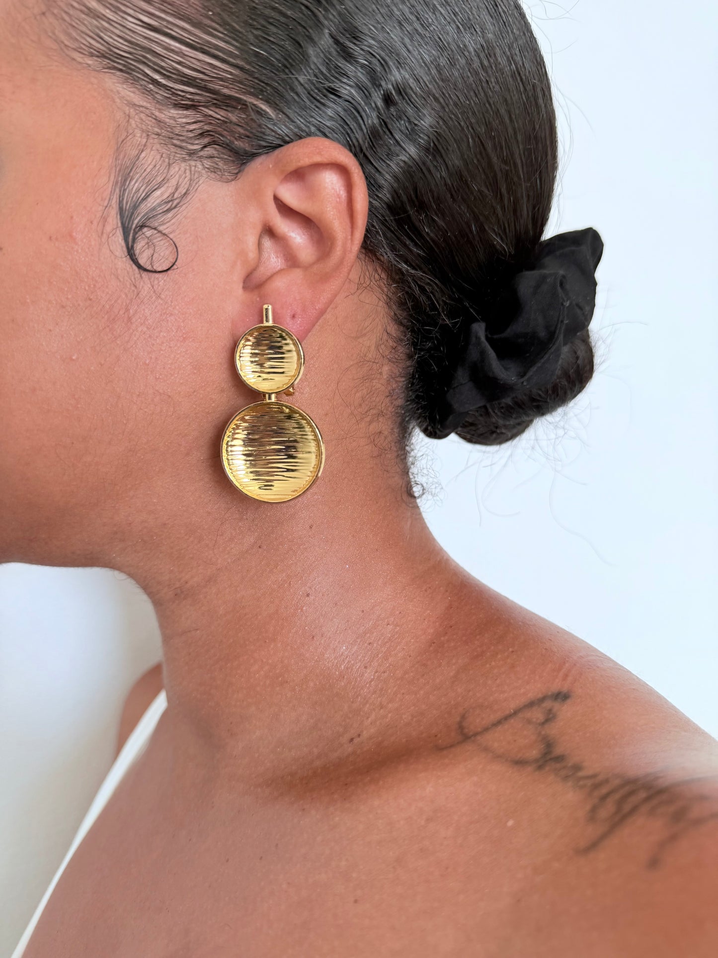 Boucle d'oreille fantaisie dorée