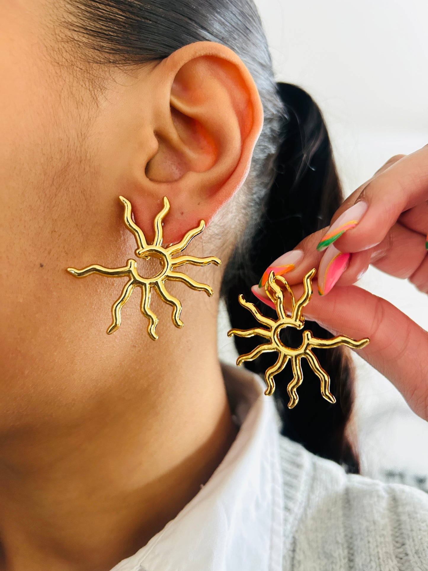 Boucle d'oreille fantaisie dorée