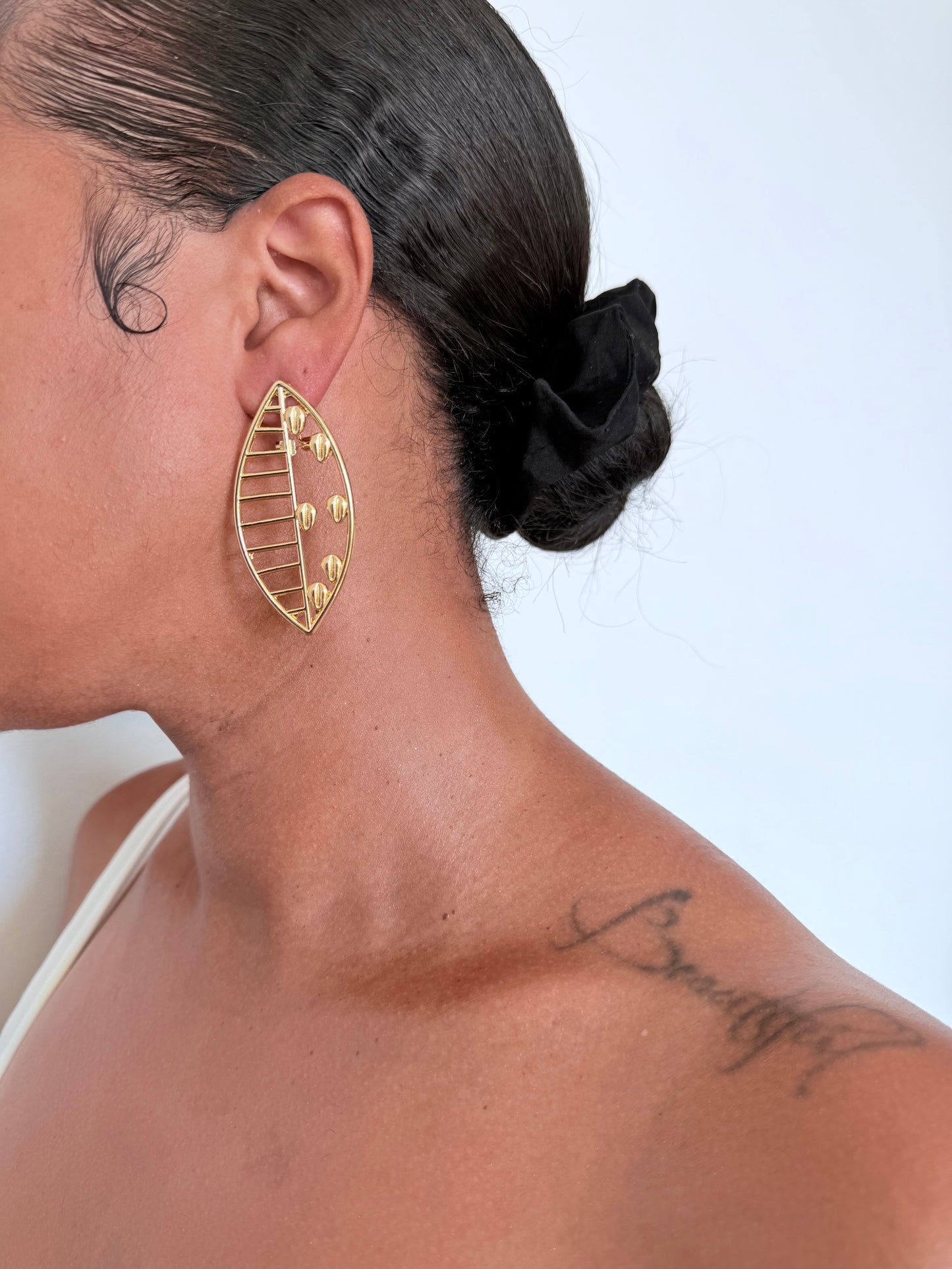 Boucle d'oreille fantaisie dorée