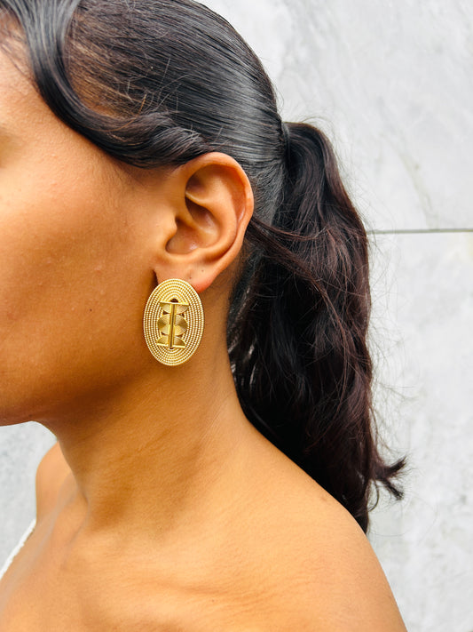 Boucle d'oreille fantaisie dorée
