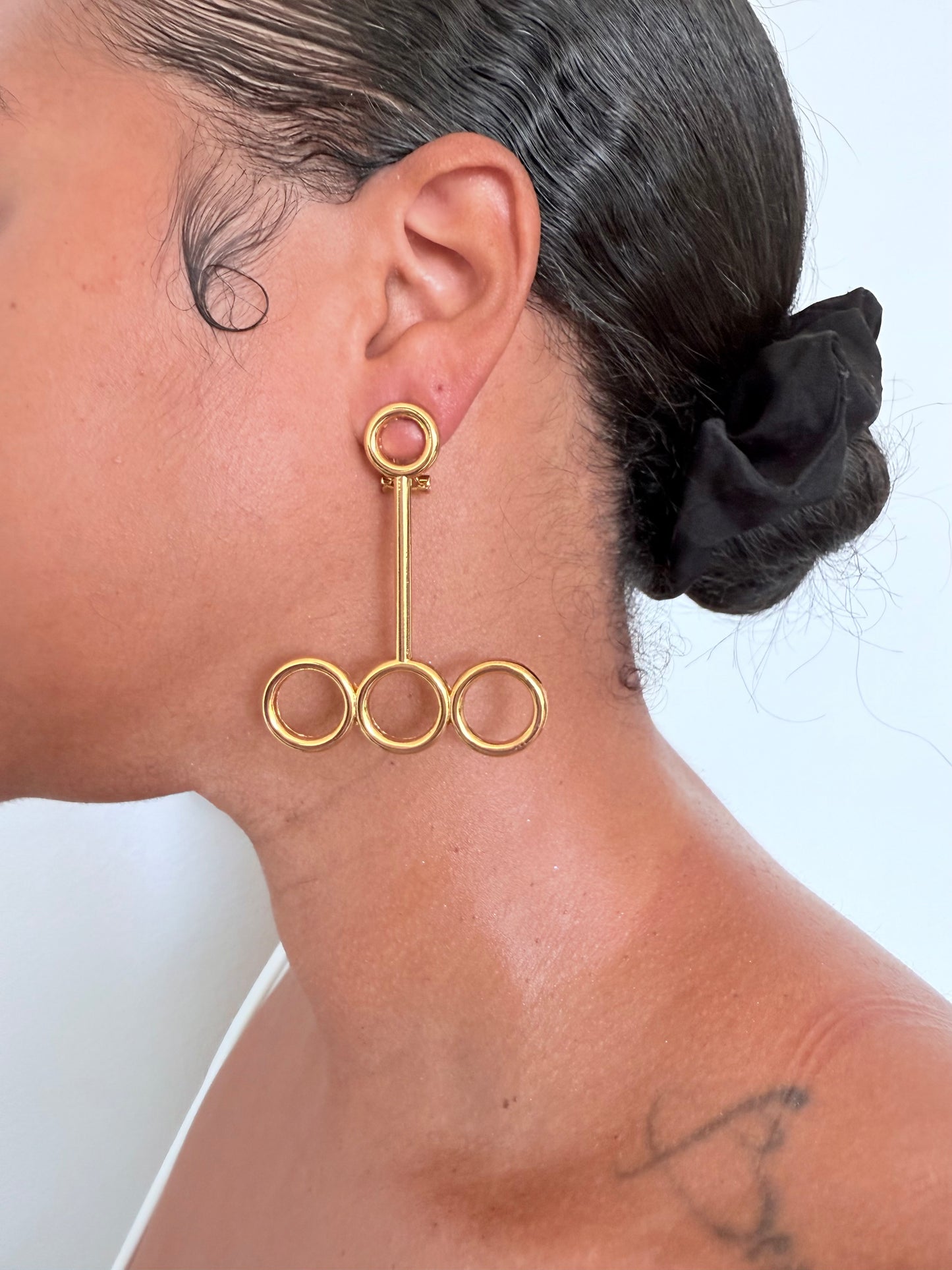 Boucle d'oreille fantaisie dorée