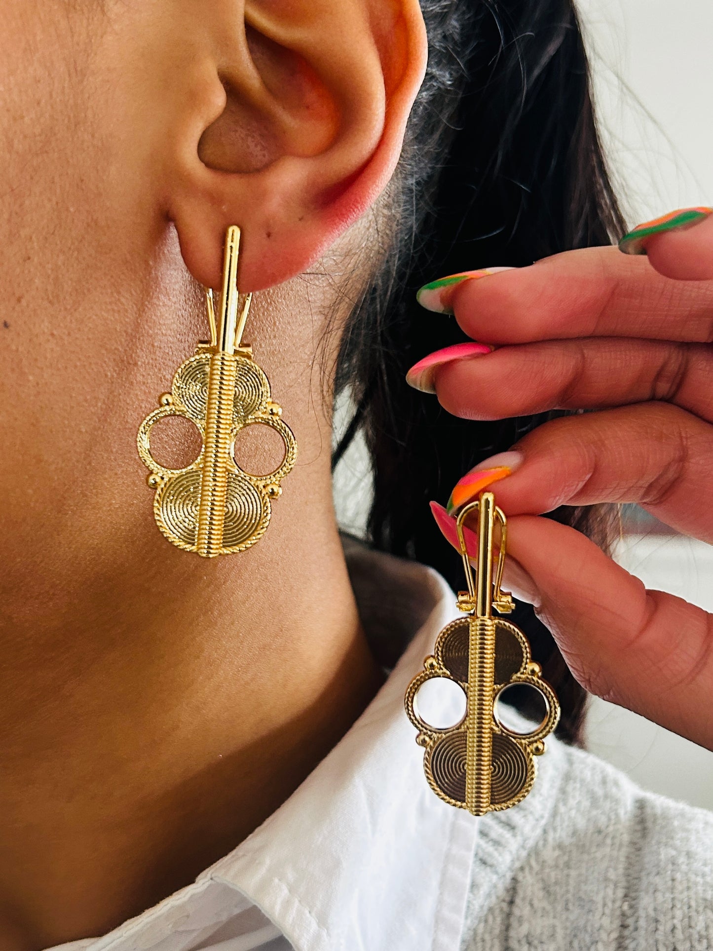 Boucle d'oreille fantaisie dorée