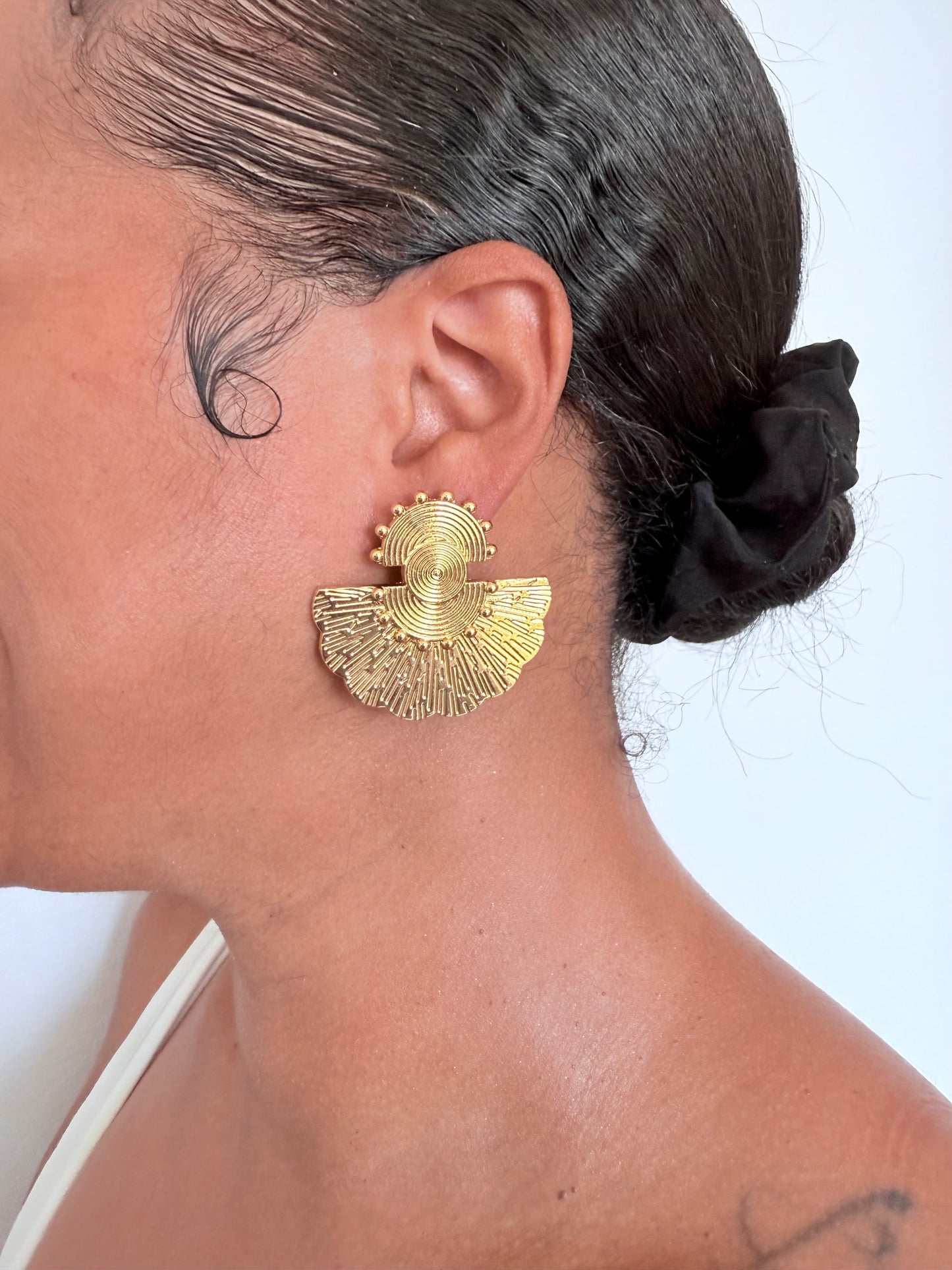 Boucle d'oreille fantaisie dorée