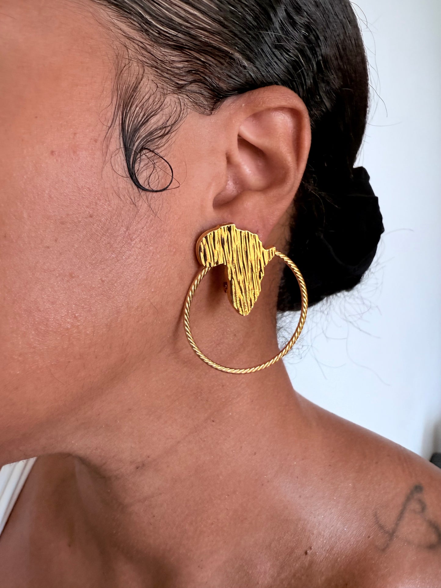 Boucle d'oreille fantaisie dorée