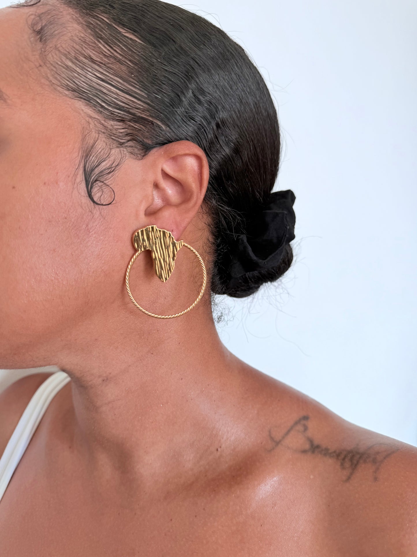 Boucle d'oreille fantaisie dorée
