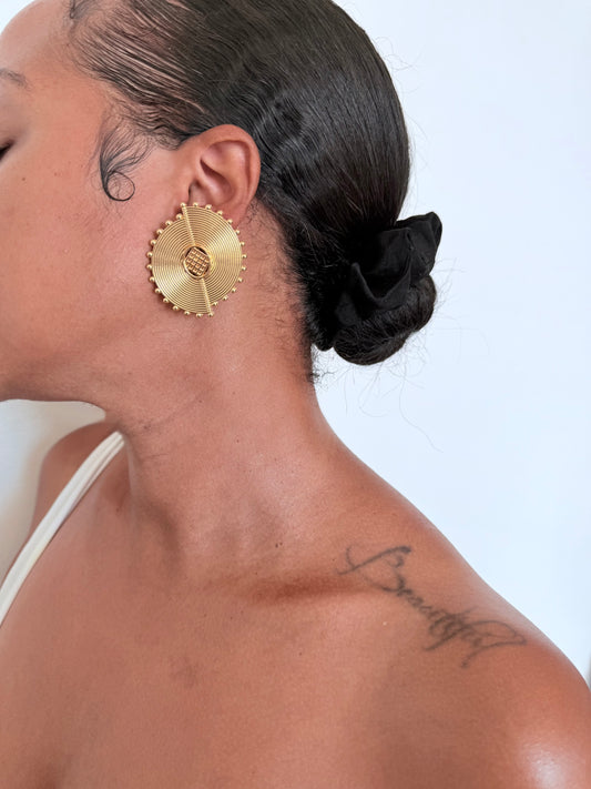 Boucle d'oreille fantaisie dorée
