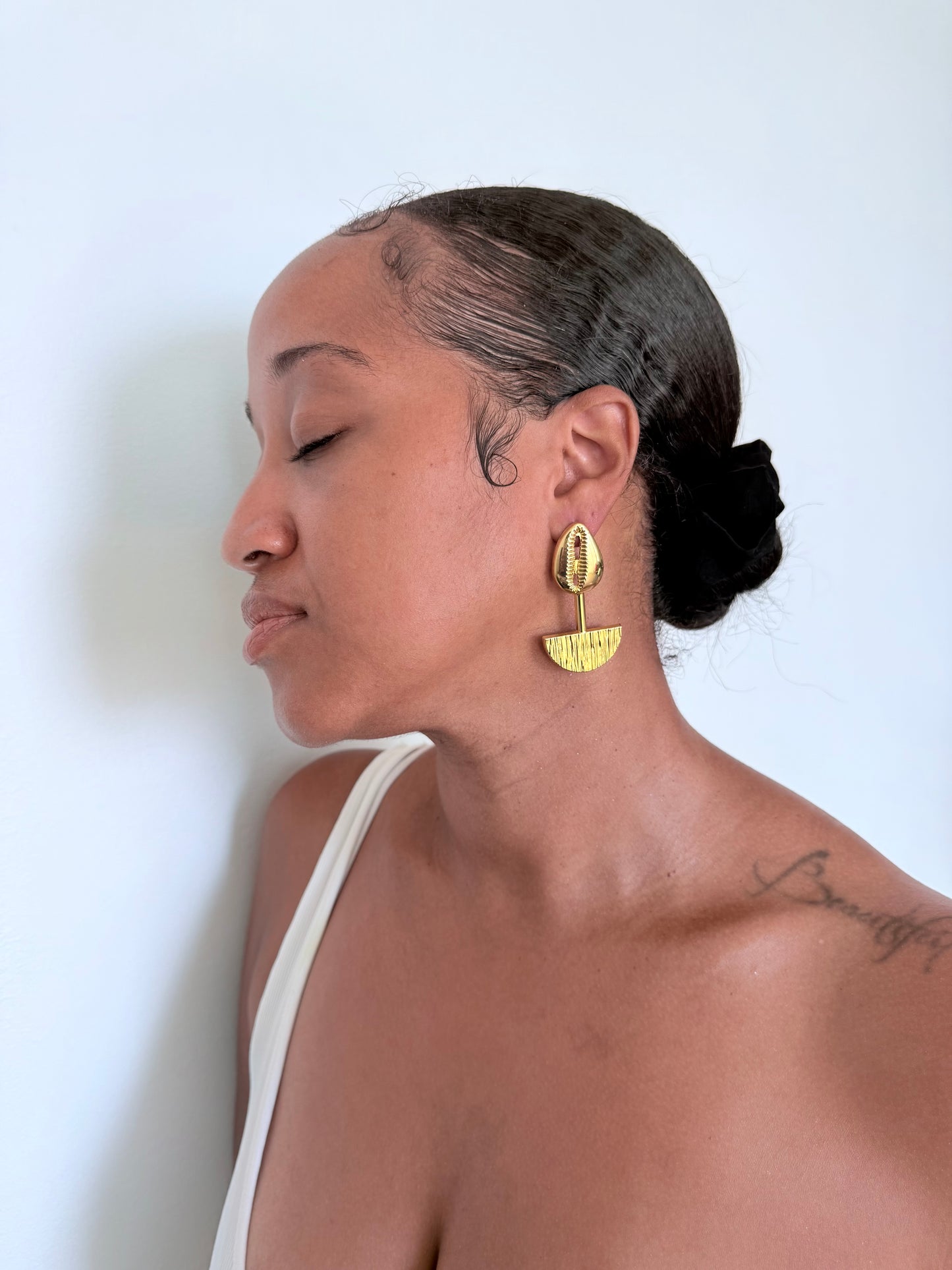Boucle d'oreille fantaisie dorée