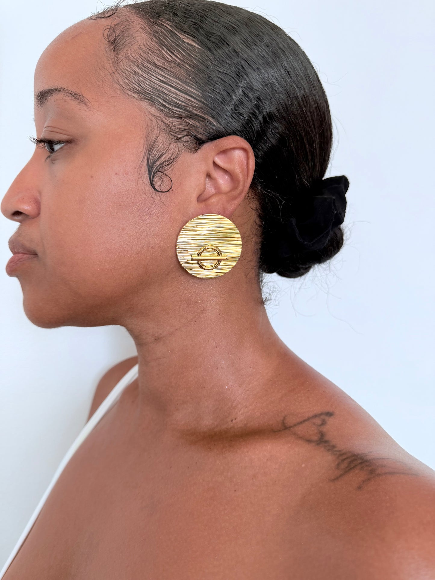 Boucle d'oreille fantaisie dorée