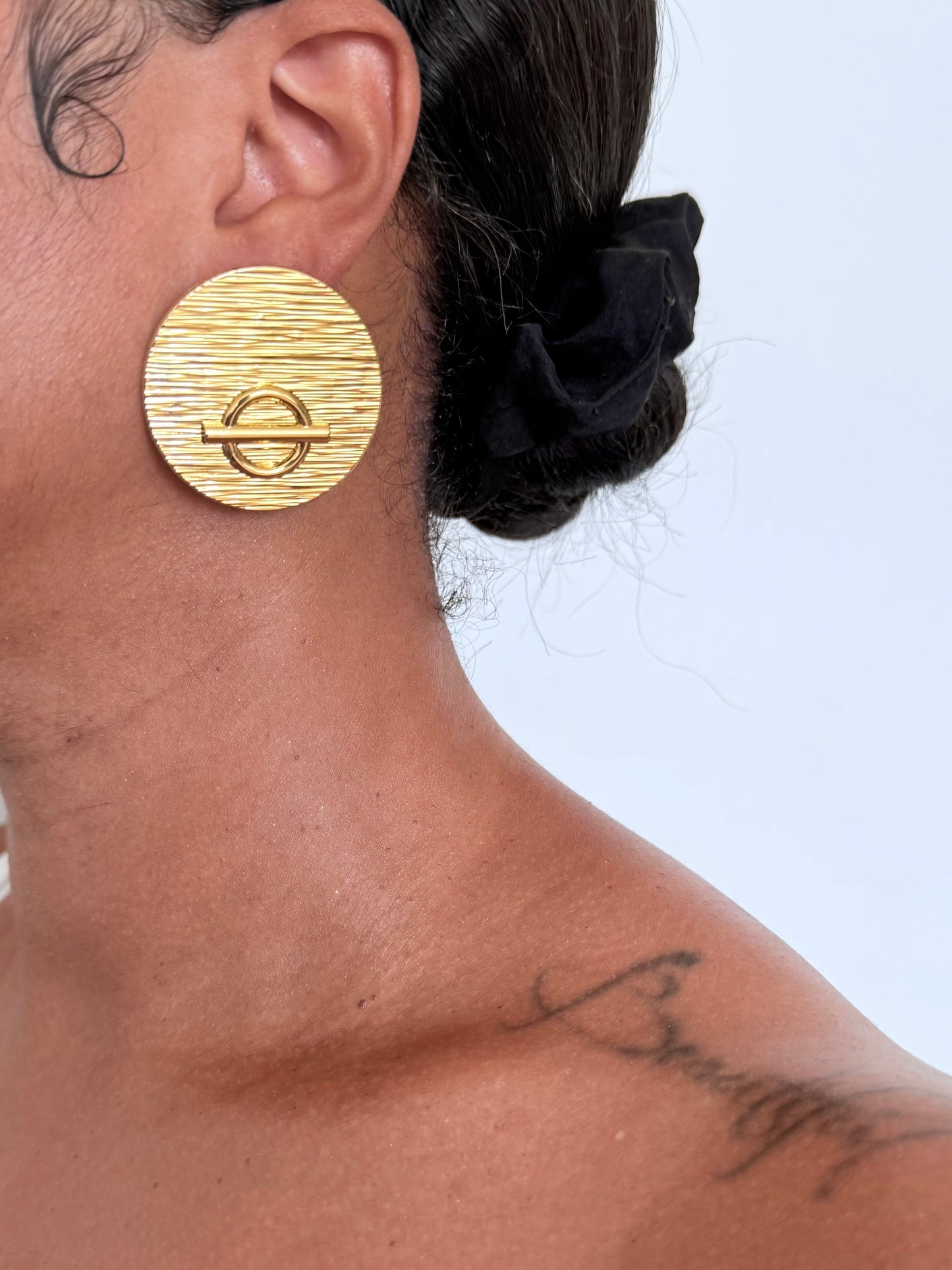 Boucle d'oreille fantaisie dorée